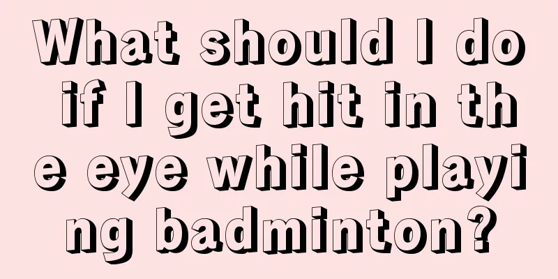 What should I do if I get hit in the eye while playing badminton?