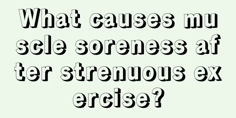 What causes muscle soreness after strenuous exercise?